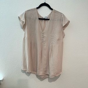 Pink and black polka-dot blouse